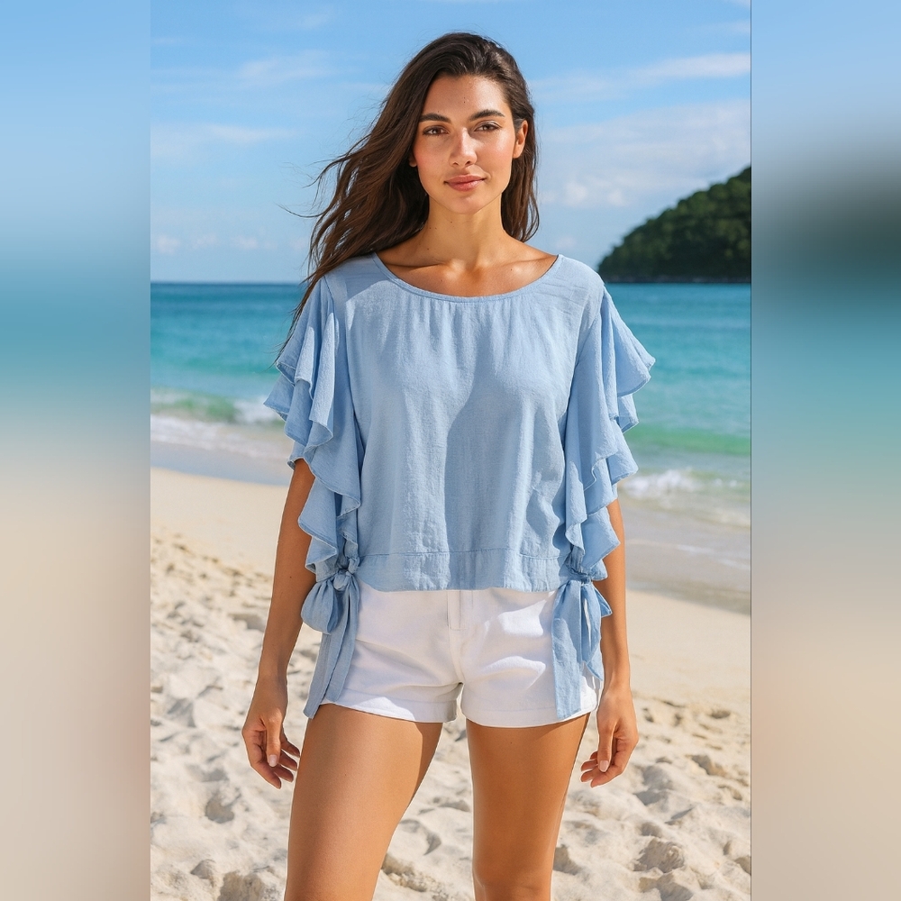 ODEON Light Blue summer flutter top with ties at the side SZ 44 European or M/L